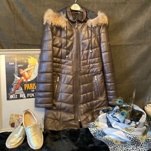 # 159 IPARELDE leather and fur puffer jacket
